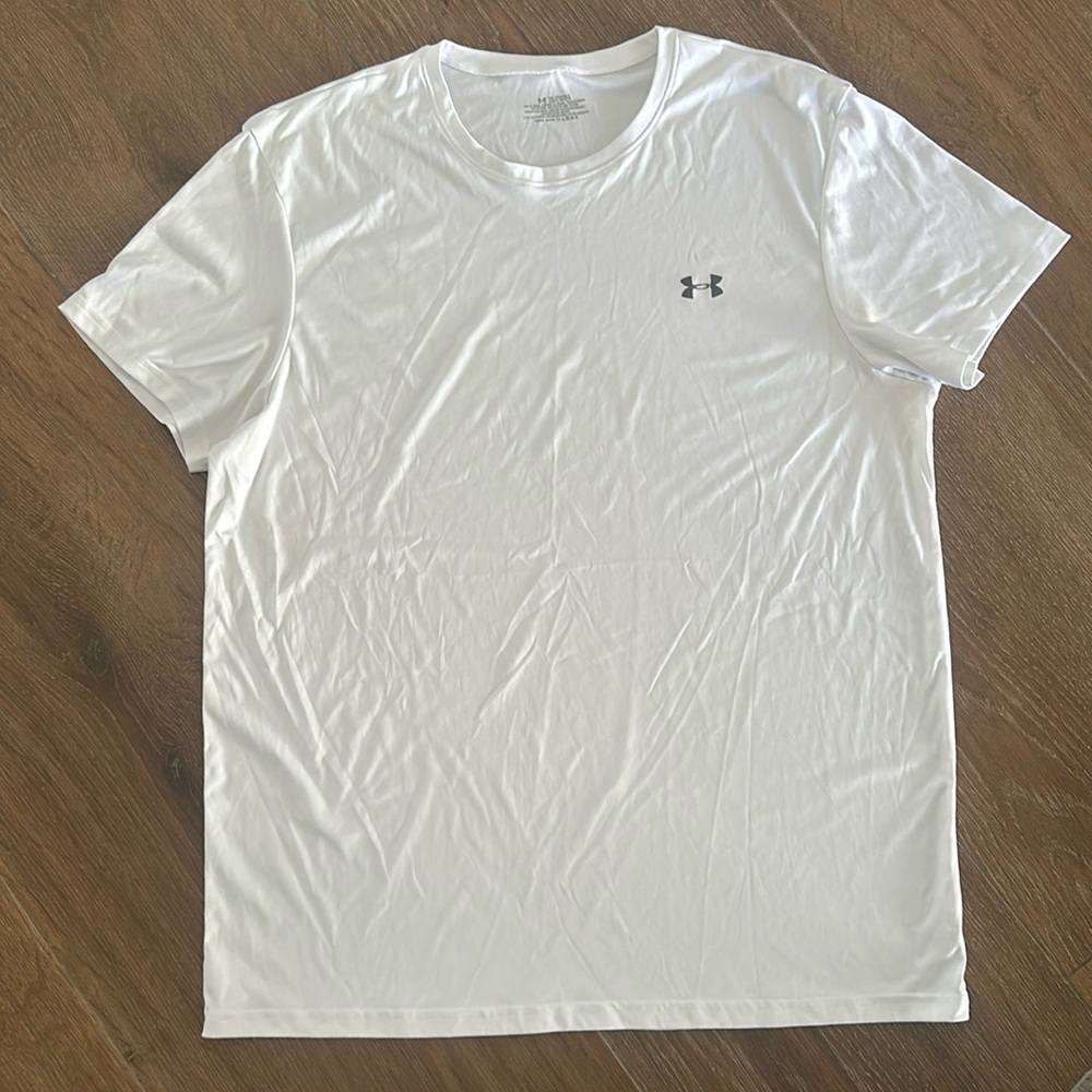 Under Armour men's tee shirt. Size 2XL. Color white with dark grey emblem.
